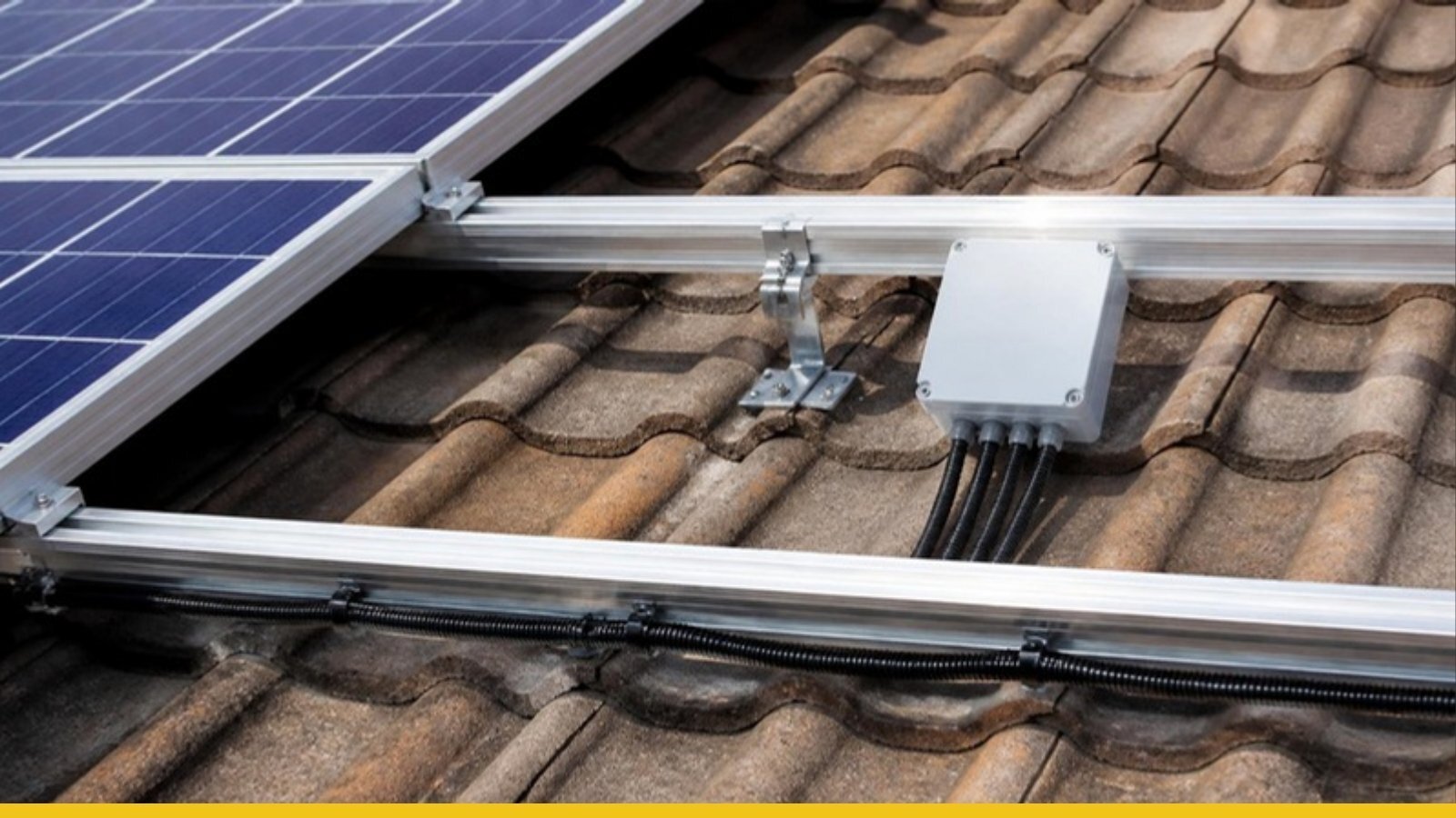 Close-up of neat rooftop solar mounting rails, roof hooks and cabling